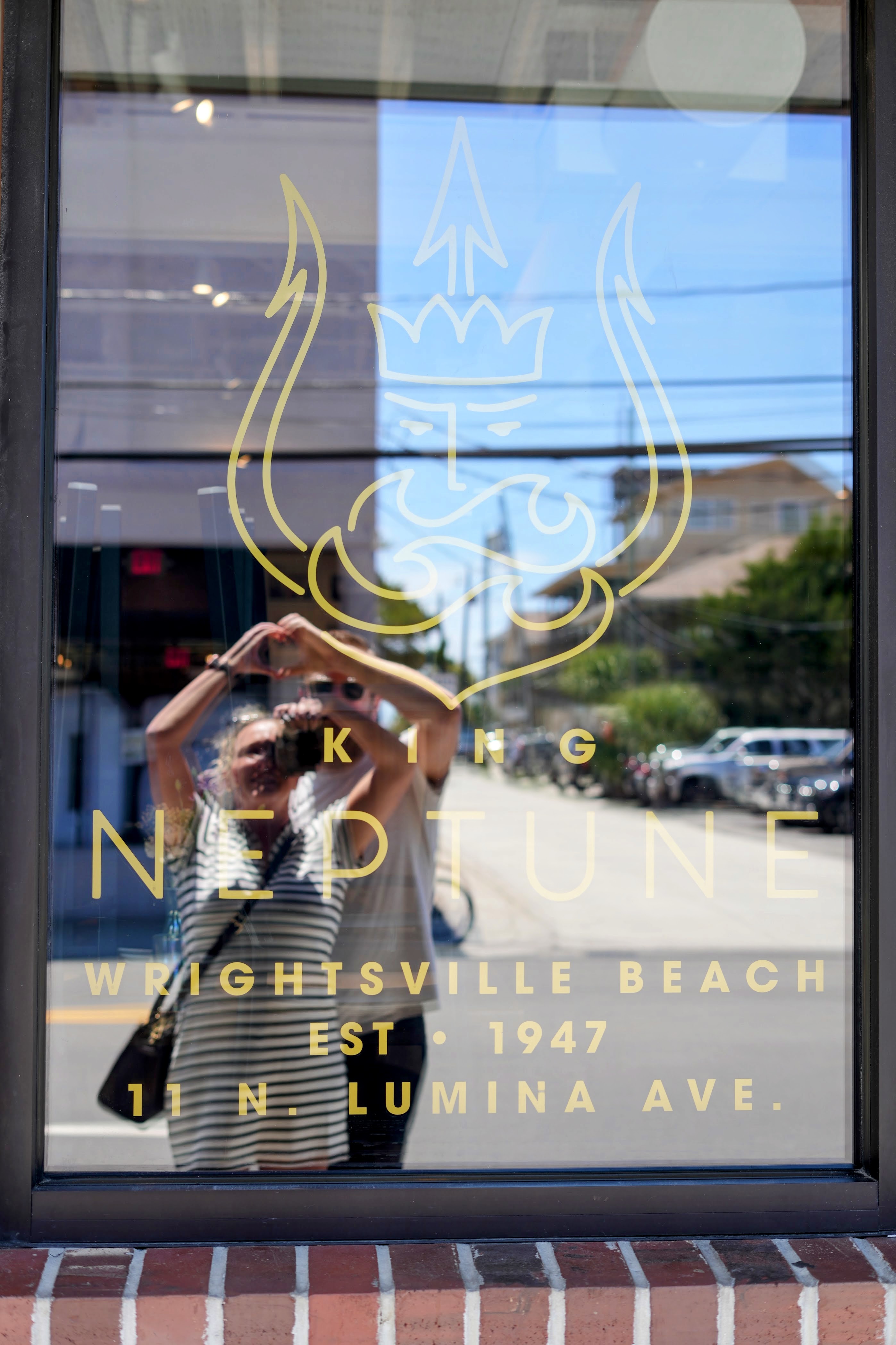 King Neptune restaurant with its gold trident logo, a Wrightsville Beach institution since 1947, in Wrightsville Beach, NC.
