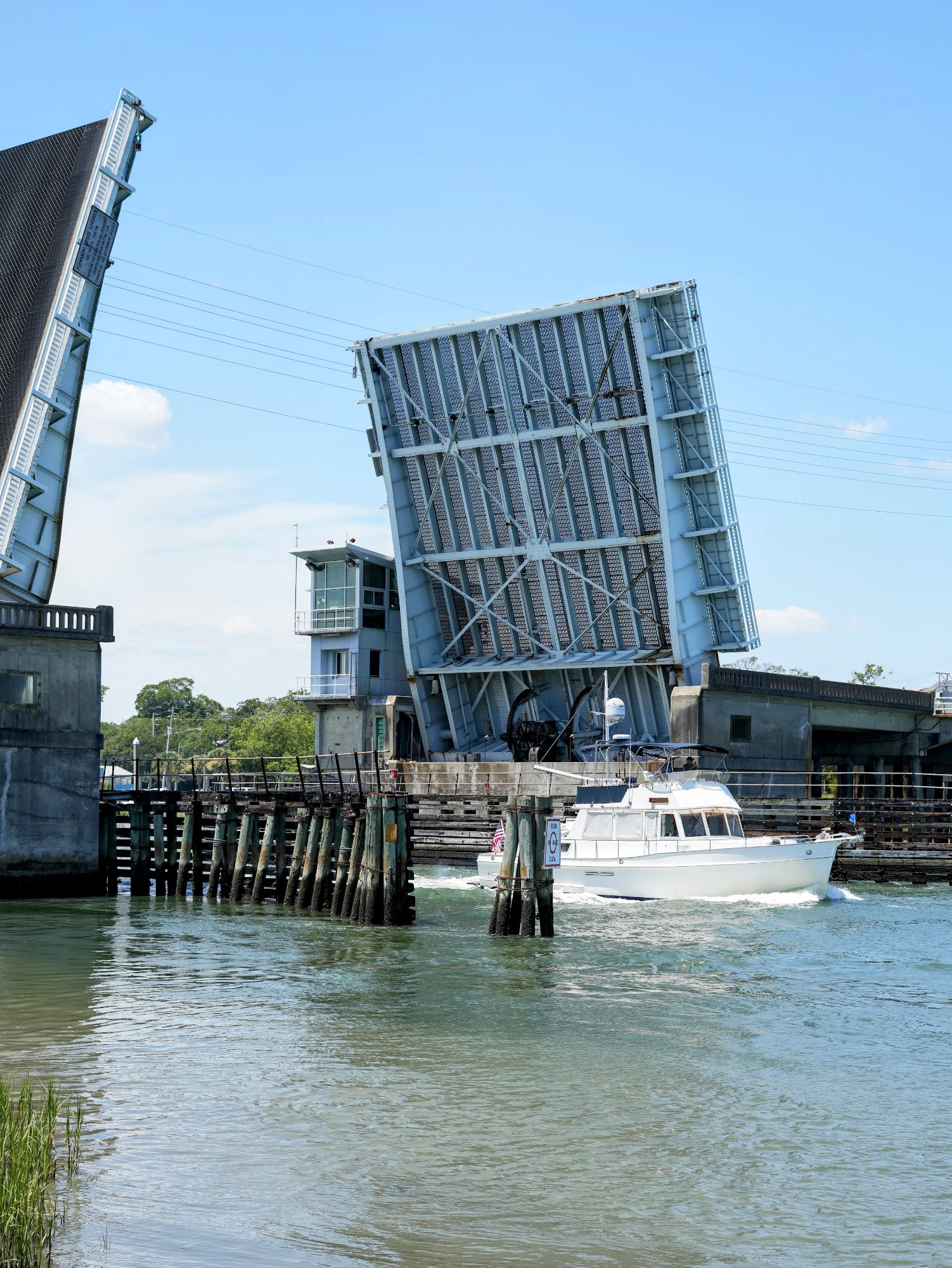 Wrightsville Beach drawbridge raised to let a boat pass on the Intracoastal Waterway, NC.