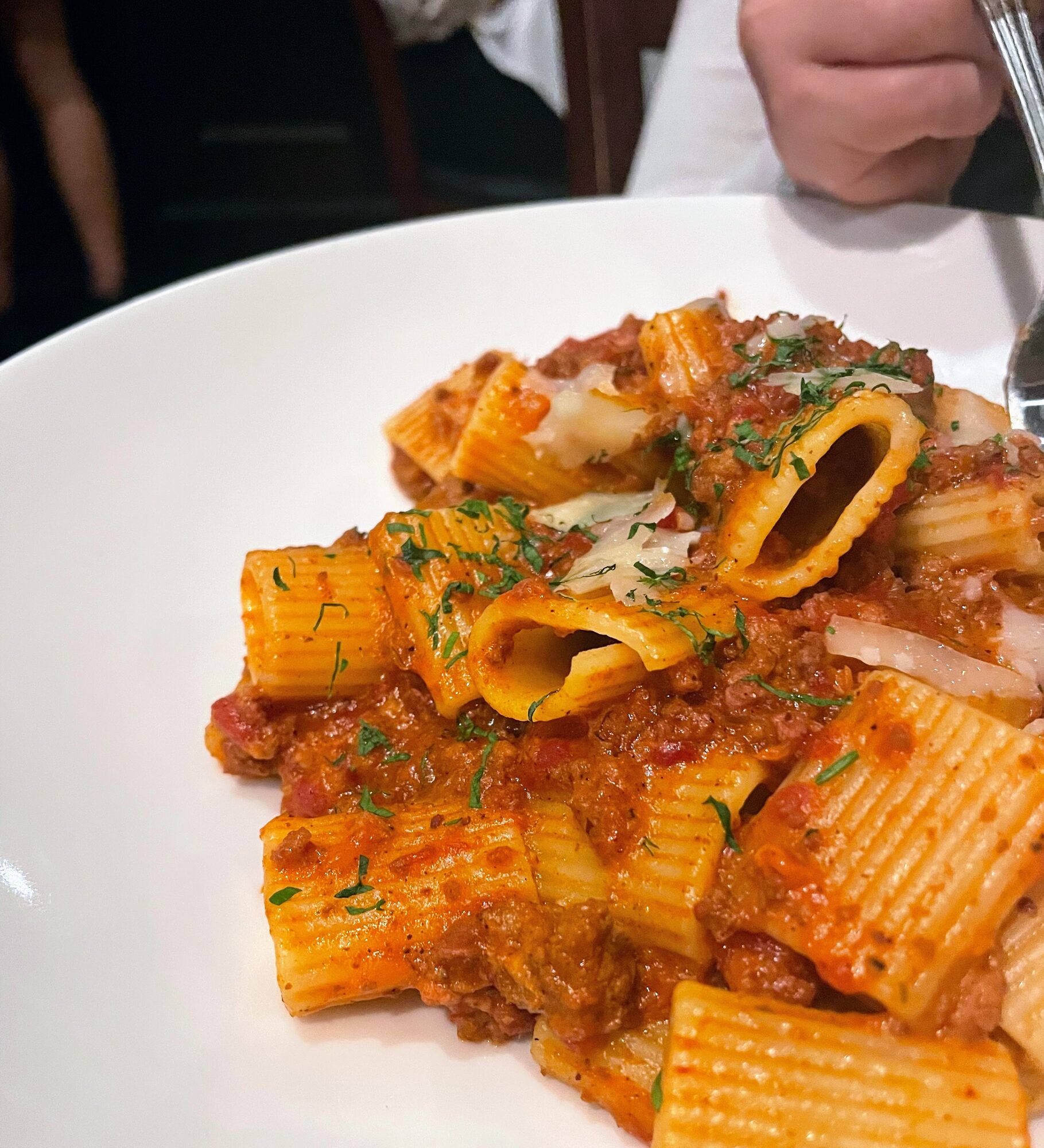 Rigatoni in a tomato meat sauce, finished with shaved cheese and chopped parsley, at Brasserie du Soleil.
