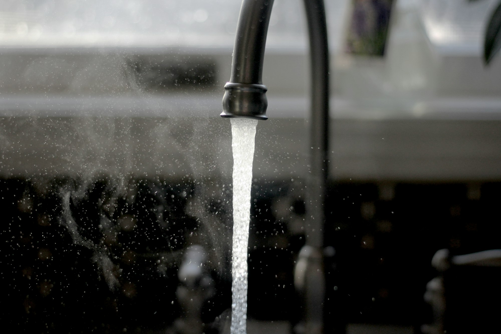 Kitchen faucet running water